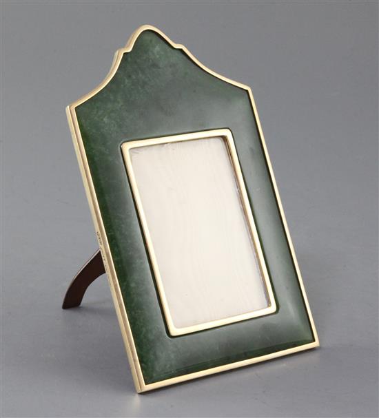 A George V 9ct gold and nephrite mounted photograph frame by Percy Edwards Ltd, height 17.3cm.